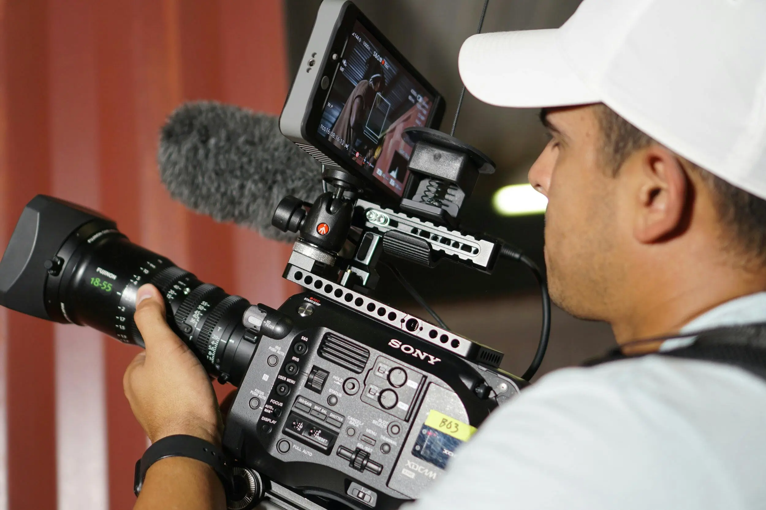 Person operating a professional video camera