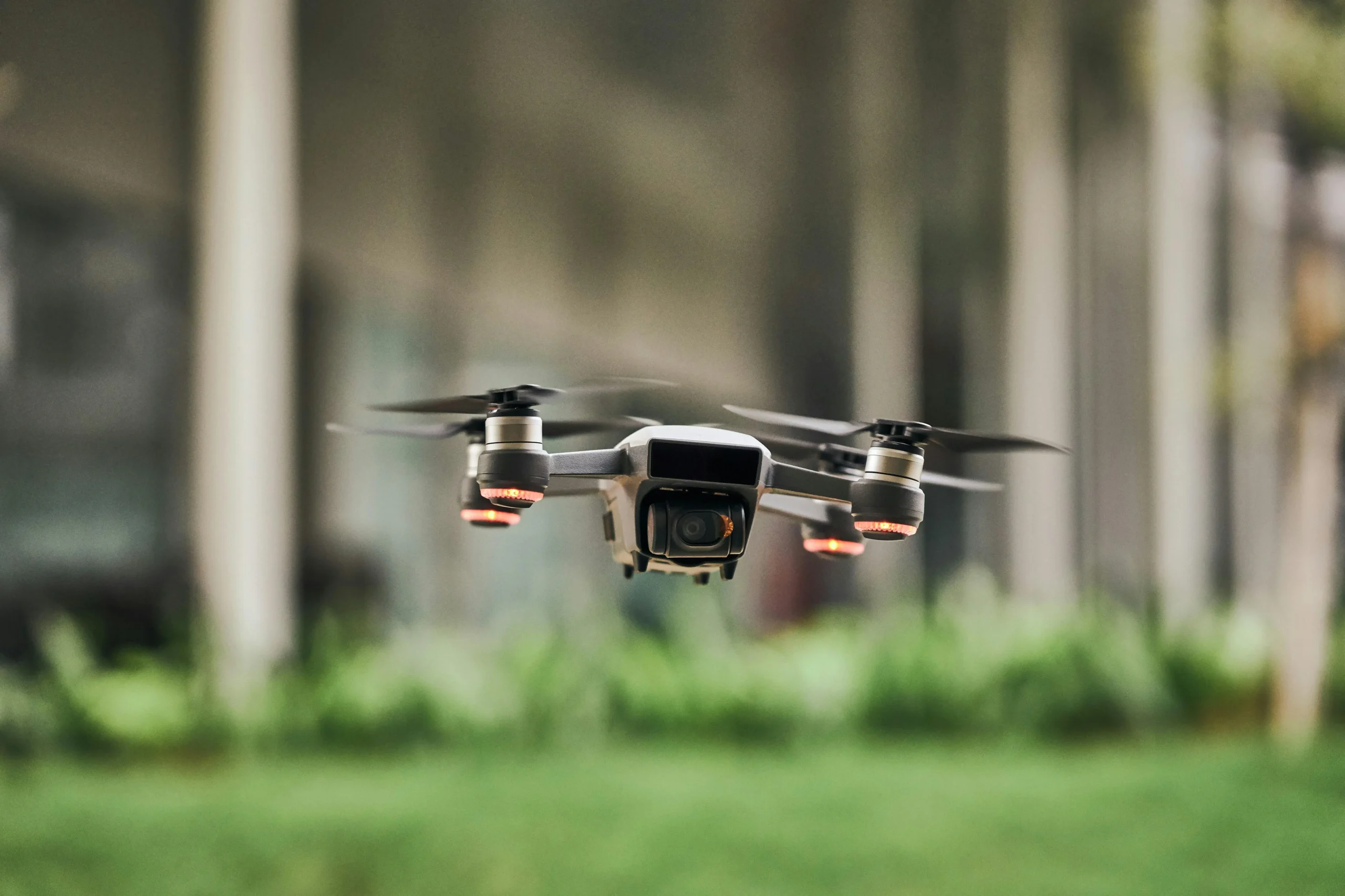 Drone flying over green background